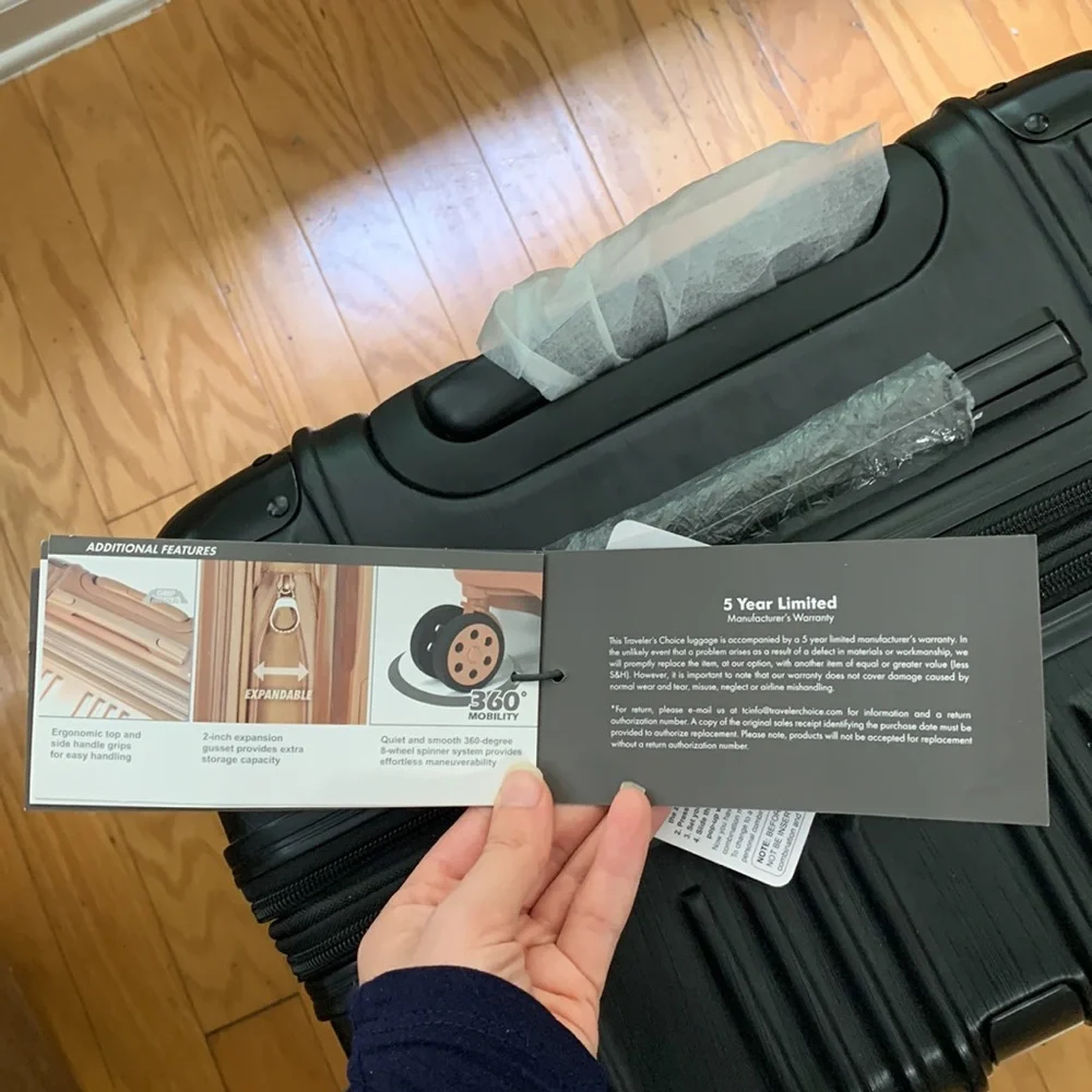 Traveler’s Choice Black Hard-case 24” Suitcase